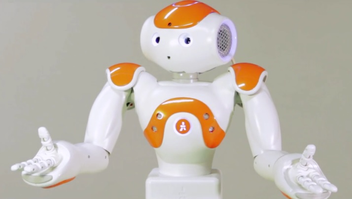 The EMOTE project's NAO robot, white and orange, with its arms open